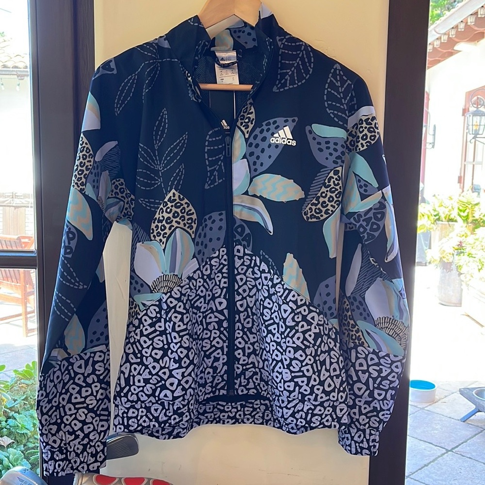 Adidas small athletic wind breaker.